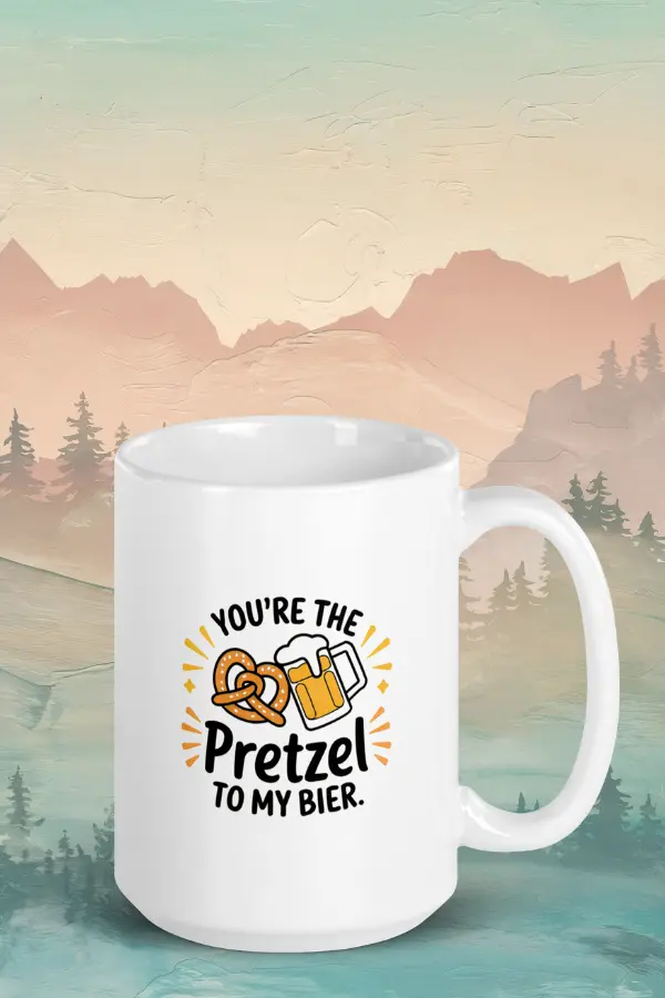 Pretzel & Bier mug Funny German mug with text "You're the pretzel to my bier" featuring images of a pretzel and a beer mug, set against a painted mountain landscape background.