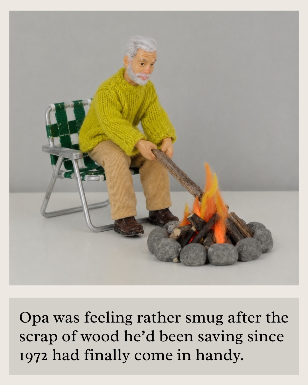 Opa by a campfire with a saved scrap of wood, humorous Vatertag graphic.