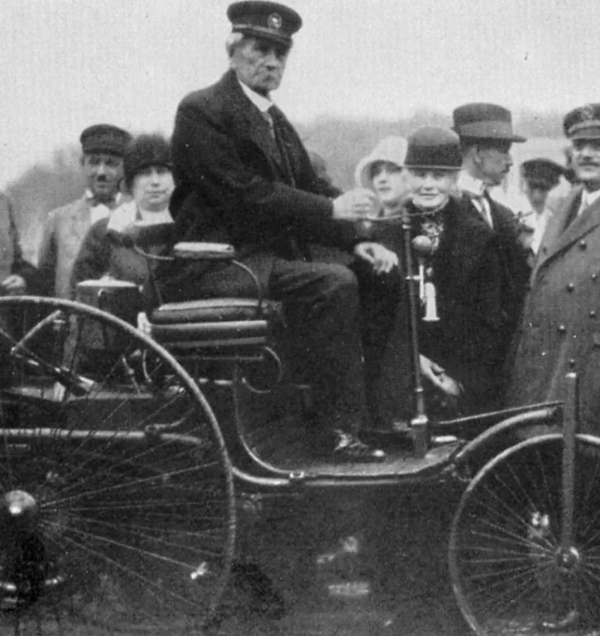 Karl Benz in an early automobile, German car pioneer in history