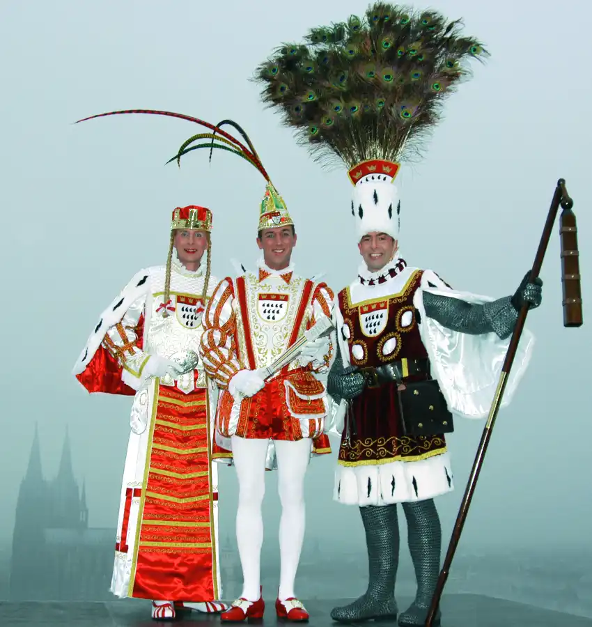 Cologne Karneval Dreigestirn in Köln wearing traditional red-and-white ceremonial costumes
