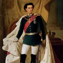A royal portrait of King Ludwig II of Bavaria in formal attire, standing with a hand on his sword, draped with a fur-trimmed red and white cloak.