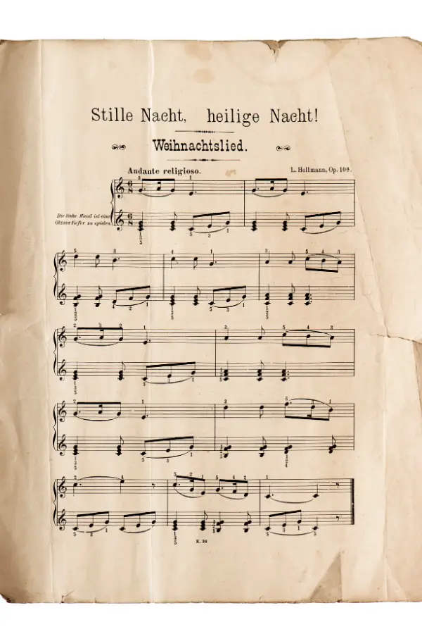 Sheet music of "Stille Nacht, heilige Nacht!" showing musical notes and German text on aged paper.