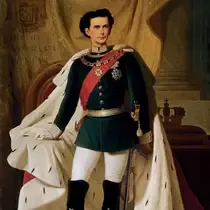 A royal portrait of King Ludwig II of Bavaria in formal attire, standing with a hand on his sword, draped with a fur-trimmed red and white cloak.